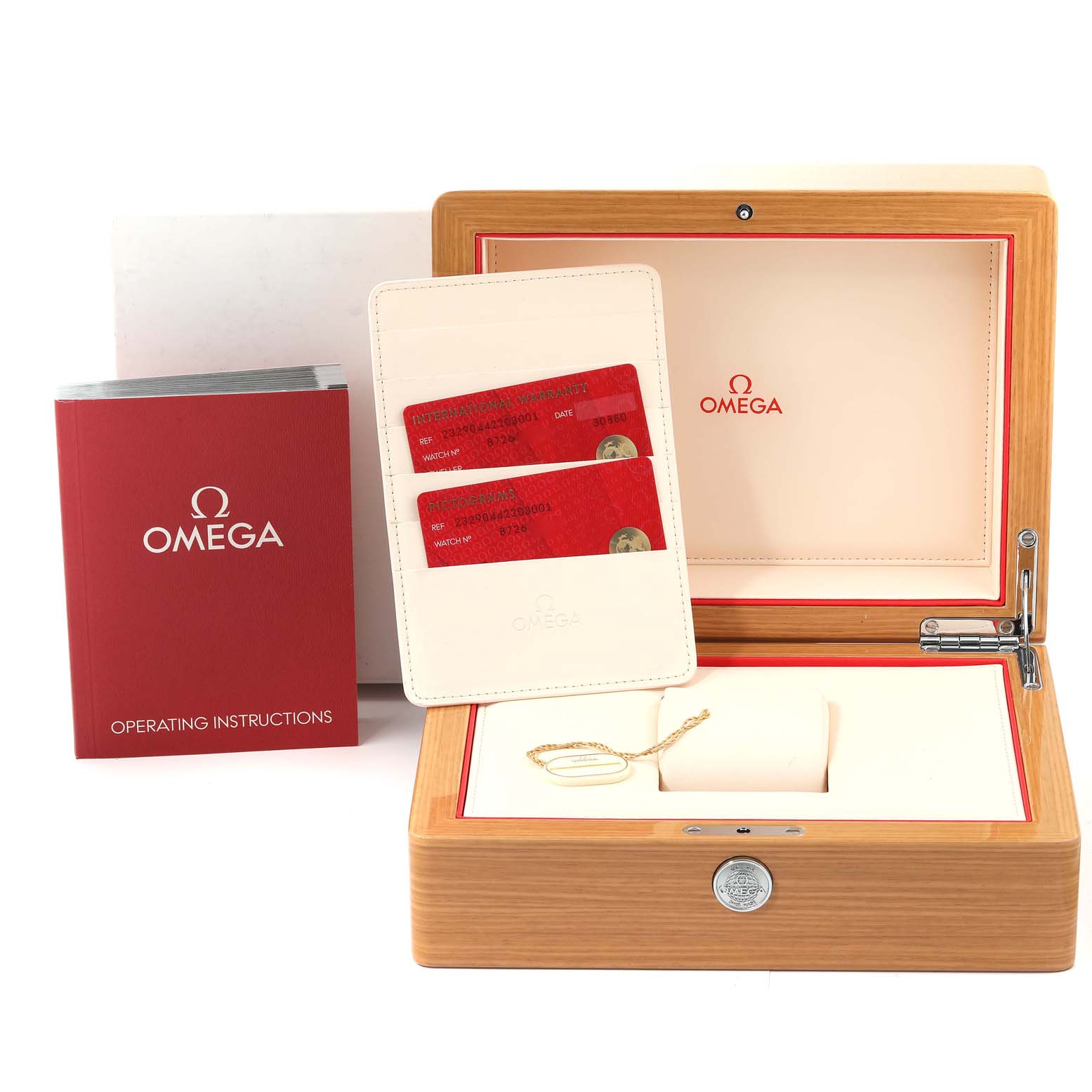 The image shows the box, warranty cards, operating instructions, and holder for the Omega Planet Ocean 232.90.44.22.03.001 Men's Titanium Blue Dial 232.90.44.22.03.001 Men's Titanium Blue Dial model.