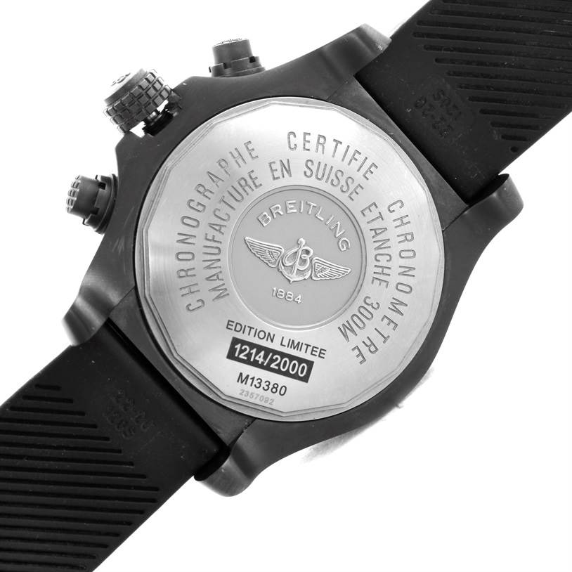 The image shows the back case of a Breitling Avenger M73390 Men's Stainless Steel Black Dial M73390 Men's Stainless Steel Black Dial watch, displaying its engravings and straps.