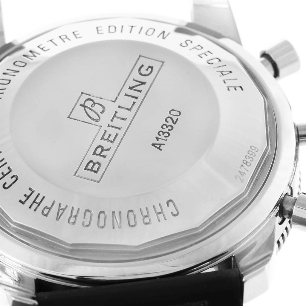 The image shows the back case of a Breitling Superocean A13320 Men's Stainless Steel Black Dial A13320 Men's Stainless Steel Black Dial watch, featuring engraved model details and branding.