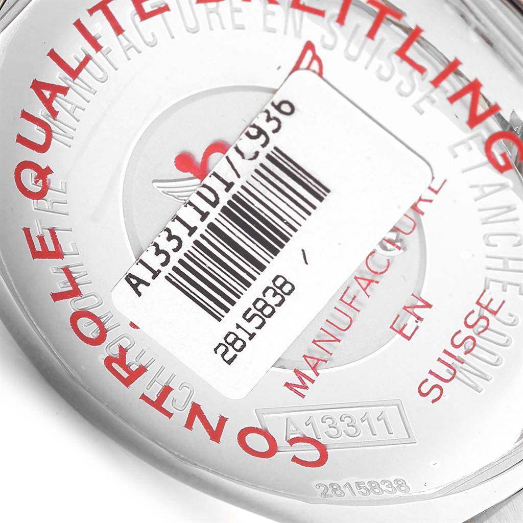 The image shows the backside of a Breitling Superocean A13311 Men's Stainless Steel Blue Dial A13311 Men's Stainless Steel Blue Dial watch, displaying serial numbers and branding.