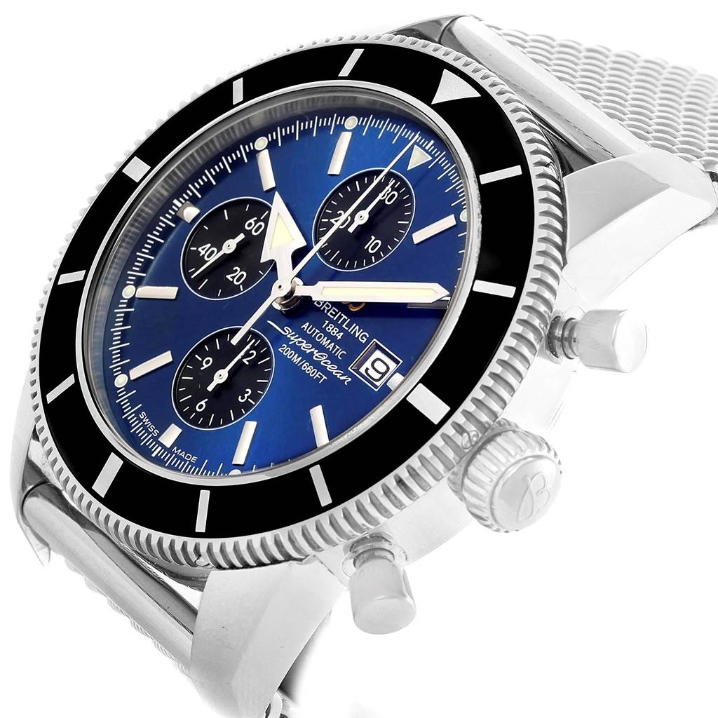 The Breitling Superocean A13320 Men's Stainless Steel Blue Dial A13320 Men's Stainless Steel Blue Dial watch is shown at an angled close-up, displaying its blue dial, bezel, subdials, and part of the mesh strap.