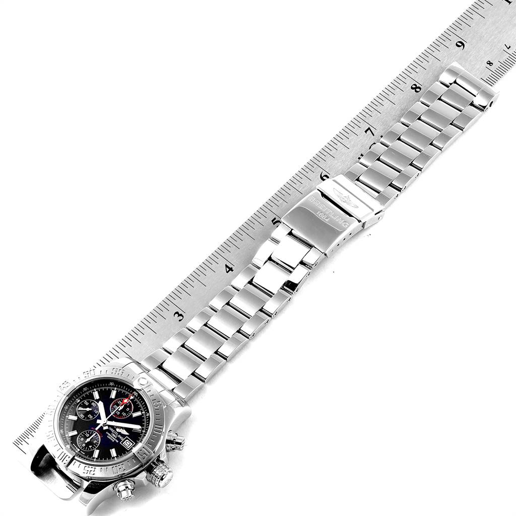 The Breitling Avenger A13381 Men's Stainless Steel Black Dial A13381 Men's Stainless Steel Black Dial watch is shown from a top-down angle, featuring its face, bezel, and full bracelet with a ruler for scale.