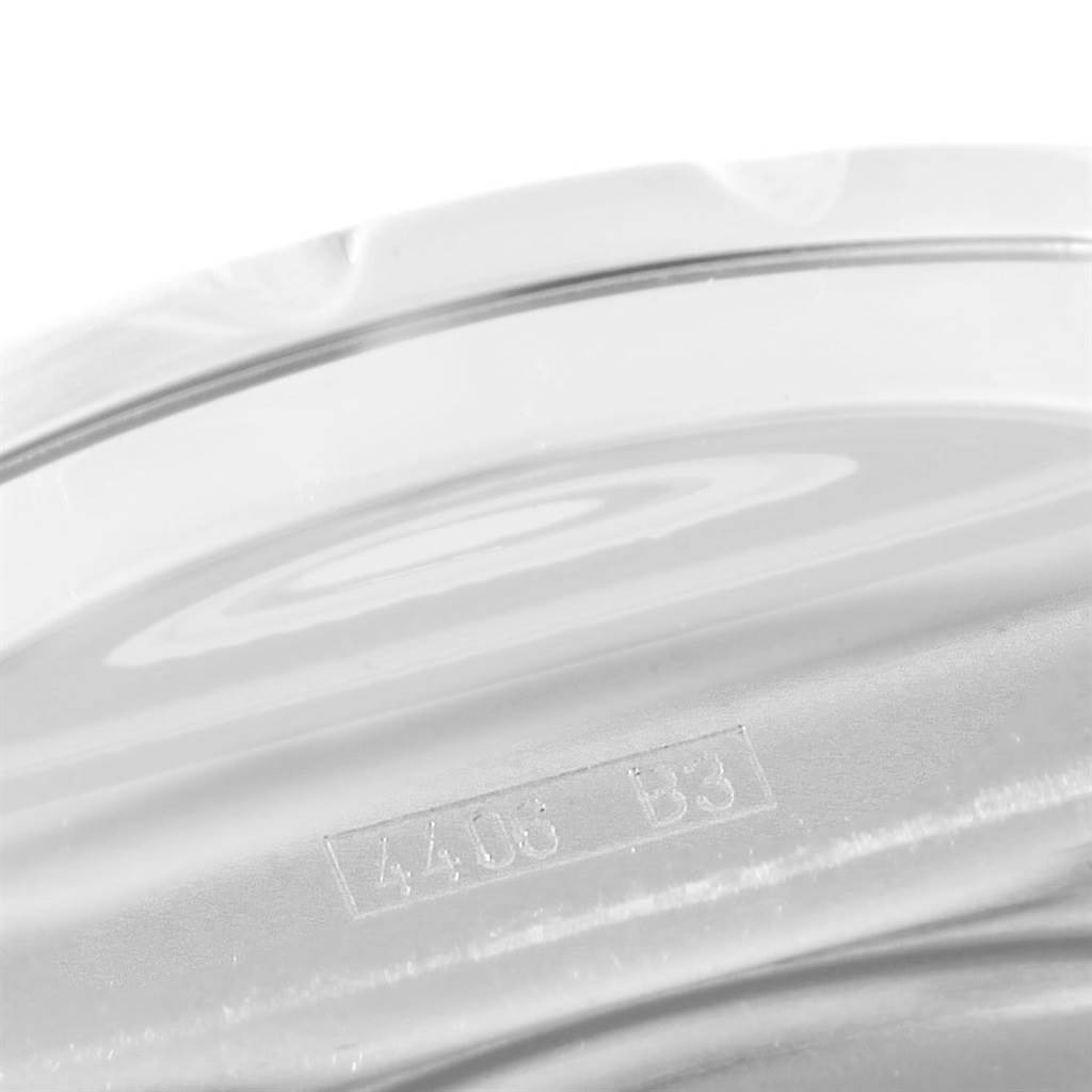 This image shows a close-up of the casing part, likely the bezel, of a Breitling Bentley A44362 Men's Stainless Steel Blue Dial A44362 Men's Stainless Steel Blue Dial watch, including the engraved model number.