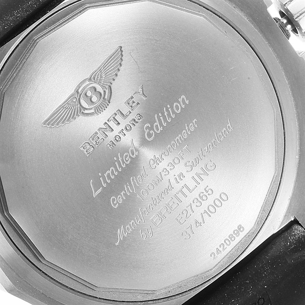 The image shows the back case of a Bentley model watch by Breitling from a close-up, straight-on angle, displaying its engravings.
