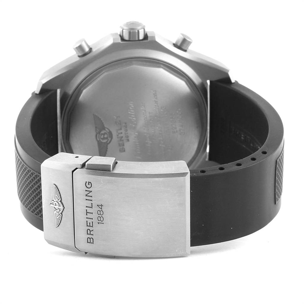 The image shows the back and clasp of a Bentley model Breitling watch, focusing on the engraved case back and the branded clasp.
