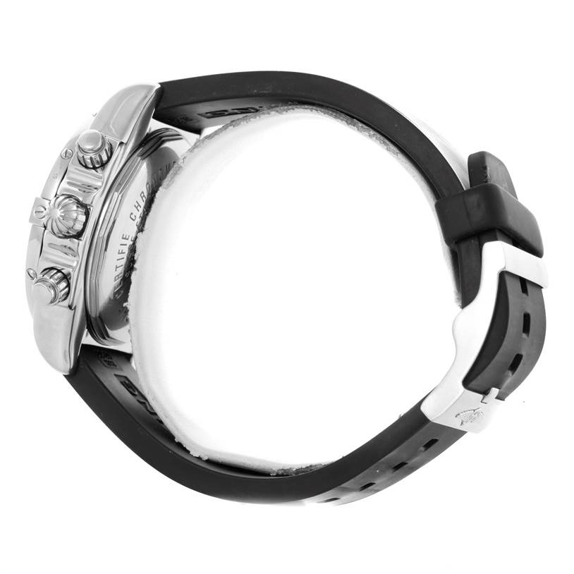 The image showcases the side view of the Breitling Chronomat A13356 Men's Stainless Steel Grey Dial A13356 Men's Stainless Steel Grey Dial, highlighting the watch case, crown, pushers, and a portion of the rubber strap.