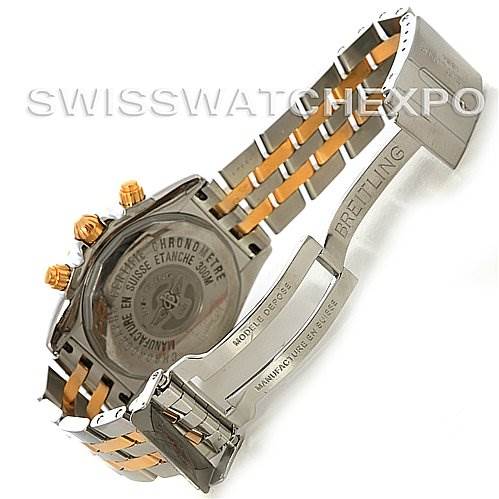 The image shows the back and bracelet clasp of a Breitling Chronomat C1335611/K515-TT Men's Stainless Steel Burgundy Dial C1335611/K515-TT Men's Stainless Steel Burgundy Dial watch, highlighting the case back and two-tone metal bracelet.
