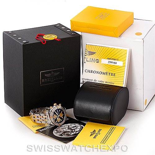 The Breitling Chronomat B13356 Men's Steel and Gold (two tone) Black Dial B13356 Men's Steel and Gold (two tone) Black Dial watch is shown with its box, documentation, and leather case, viewed from a front angle.