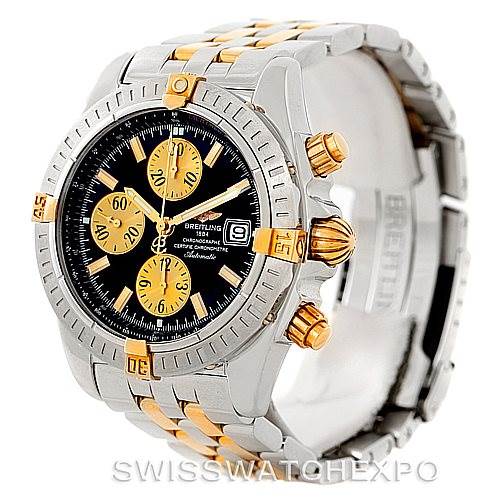 This image shows a Breitling Chronomat B13356 Men's Steel and Gold (two tone) Black Dial B13356 Men's Steel and Gold (two tone) Black Dial watch at a slight angle, highlighting its bezel, dial, and bracelet with gold accents.