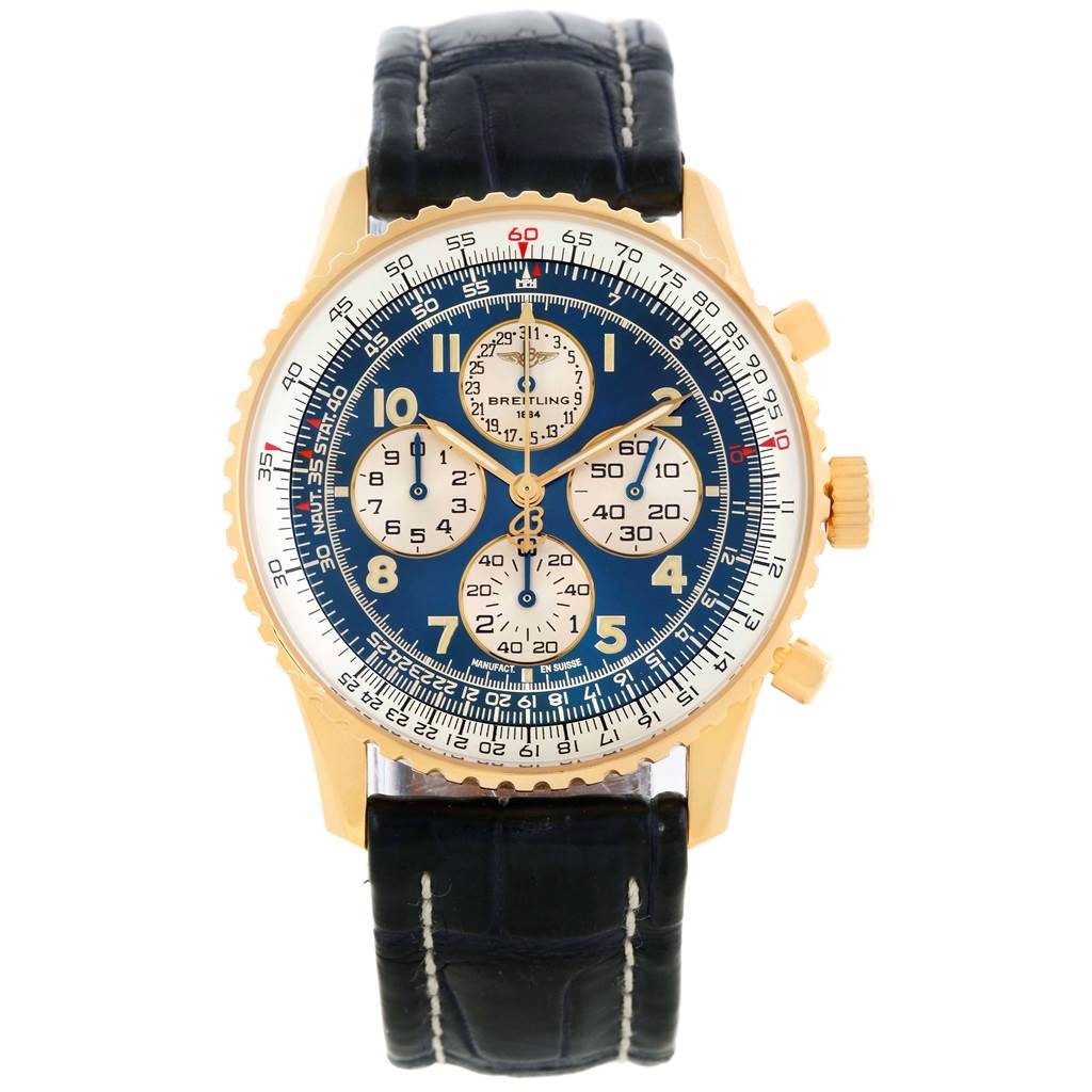 This is a frontal view of a Breitling Navitimer K33030 Men's Yellow Gold Blue Dial K33030 Men's Yellow Gold Blue Dial watch showing its face, bezel, pushers, and leather strap.