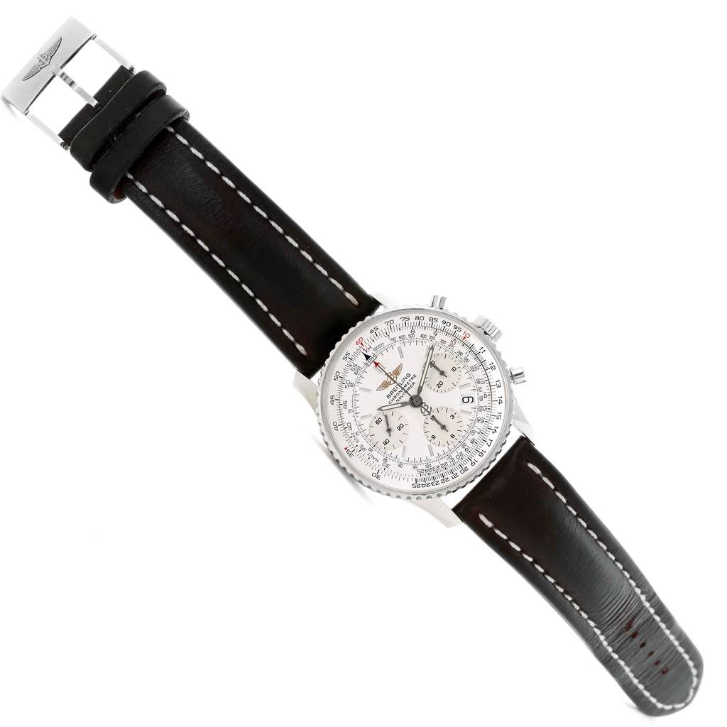 The Breitling Navitimer A23322 Men's Stainless Steel Silver Dial A23322 Men's Stainless Steel Silver Dial watch is shown at a slight angle, highlighting its face, bezel, chronograph buttons, and leather strap with stitching.