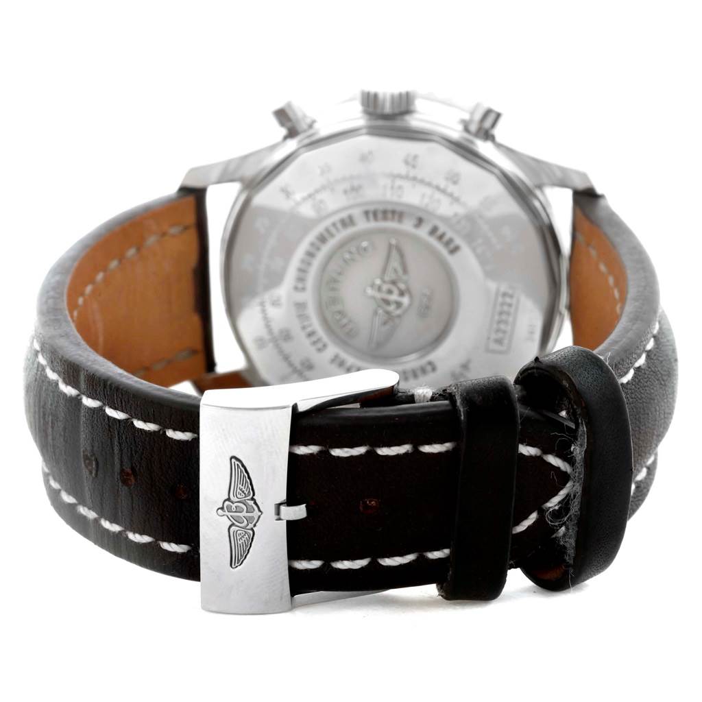 The image shows the back of a Breitling Navitimer A23322 Men's Stainless Steel Silver Dial A23322 Men's Stainless Steel Silver Dial watch, focusing on the clasp and strap with detailed stitching.