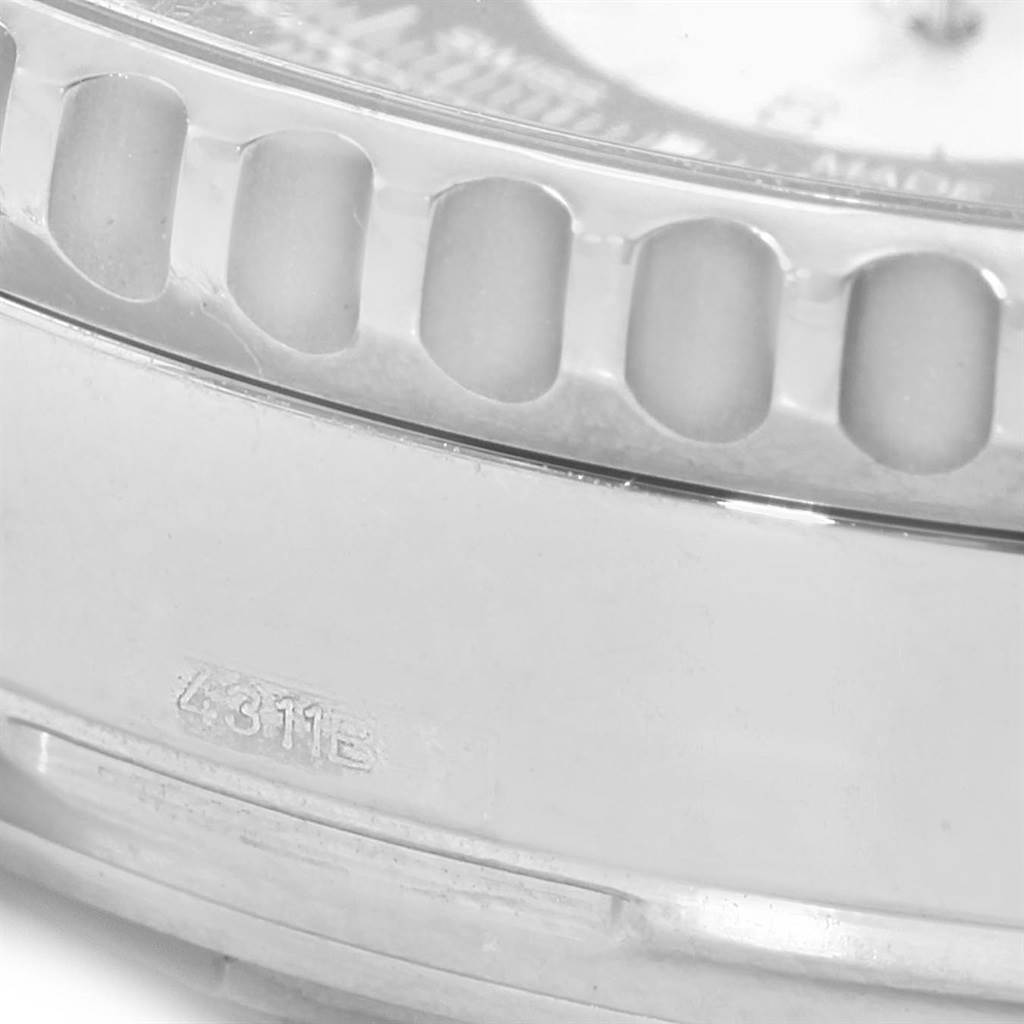 The image shows a close-up of the bezel and case of a Breitling Navitimer AB0120 Men's Stainless Steel Black Dial AB0120 Men's Stainless Steel Black Dial watch.