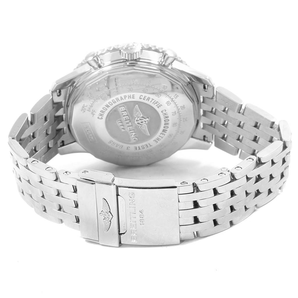 The image shows the back and closed clasp of a Breitling Navitimer AB0120 Men's Stainless Steel Black Dial AB0120 Men's Stainless Steel Black Dial watch, highlighting the engraved case back and metal bracelet.
