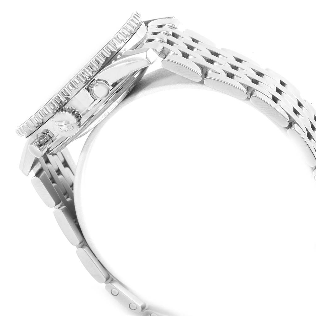 This image shows a side view of the case, bezel, crown, and part of the bracelet of a Breitling Navitimer AB0120 Men's Stainless Steel Black Dial AB0120 Men's Stainless Steel Black Dial watch.