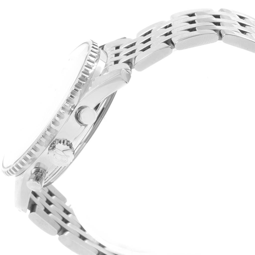 The image shows a side view of a Breitling Navitimer A23322 Men's Stainless Steel Black Dial A23322 Men's Stainless Steel Black Dial watch, focusing on its crown, pushers, case, and metal bracelet.