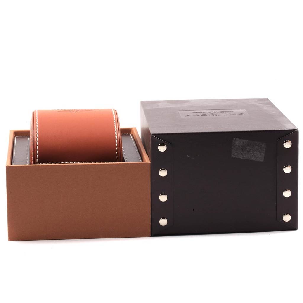 The image shows the packaging of a Breitling Navitimer A23322 Men's Stainless Steel Black Dial A23322 Men's Stainless Steel Black Dial watch, featuring a leather watch case inside a cardboard holder.