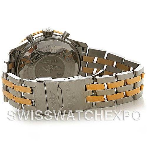 The image shows the back case and bracelet of a Breitling Navitimer D13022 Men's Stainless Steel Blue Dial D13022 Men's Stainless Steel Blue Dial watch, featuring a two-tone metal band.