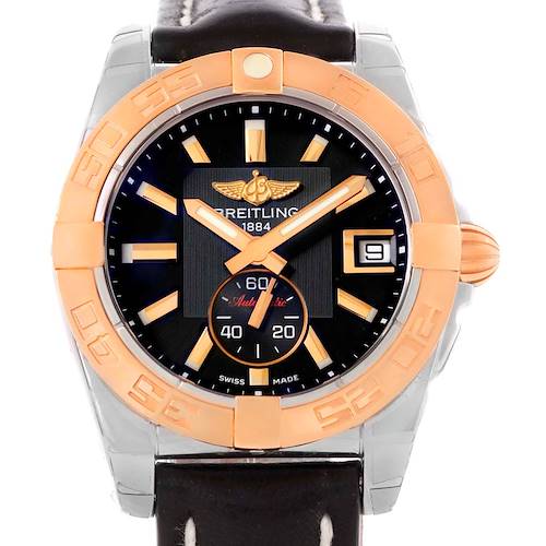 The image shows a front view of the Breitling Galactic C37330 Men's Steel and Gold (two tone) Black Dial C37330 Men's Steel and Gold (two tone) Black Dial watch, highlighting the face, hands, bezel, and part of the strap.