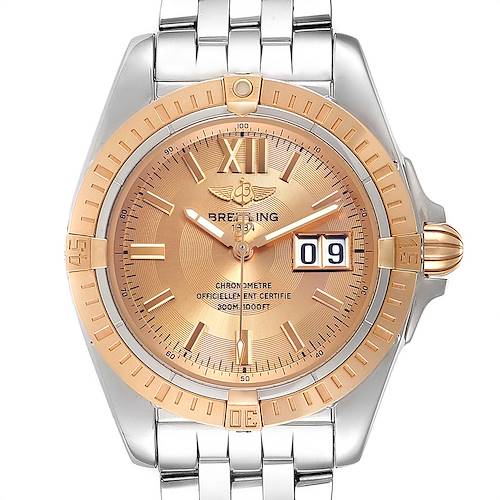 The image shows a front view of the Breitling Windrider C49350 Men's Steel and Gold (two tone) Champagne Dial C49350 Men's Steel and Gold (two tone) Champagne Dial watch, highlighting its dial, bezel, bracelet, and date window.
