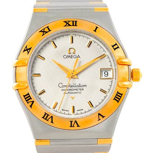 This image shows a front view of the Omega Constellation 1302.30.00 Men's Steel and Gold (two tone) Silver Dial 1302.30.00 Men's Steel and Gold (two tone) Silver Dial watch, highlighting its dial, bezel, and bracelet.