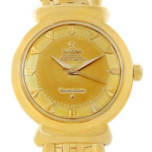 The image shows a front view of an Omega Constellation 14365 Men's Yellow Gold Champagne Dial 14365 Men's Yellow Gold Champagne Dial watch, highlighting its gold dial, hands, and portions of the band.