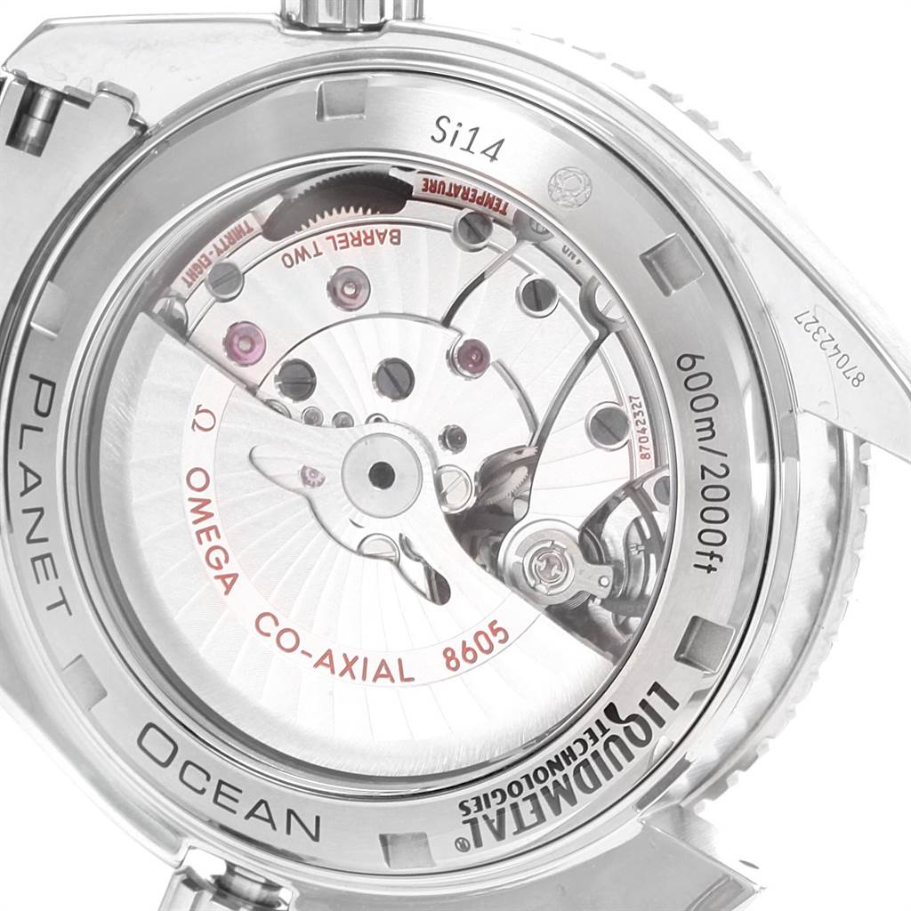 This image shows the back view of the Omega Planet Ocean 232.90.44.22.03.001 Men's Titanium Blue Dial 232.90.44.22.03.001 Men's Titanium Blue Dial watch, revealing its inner Co-Axial 8605 movement.