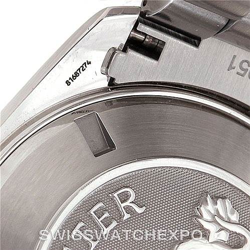 The image shows the close-up of the back case and bracelet hinge of an Omega Planet Ocean 2208.50.00 Men's Stainless Steel Black Dial 2208.50.00 Men's Stainless Steel Black Dial watch.