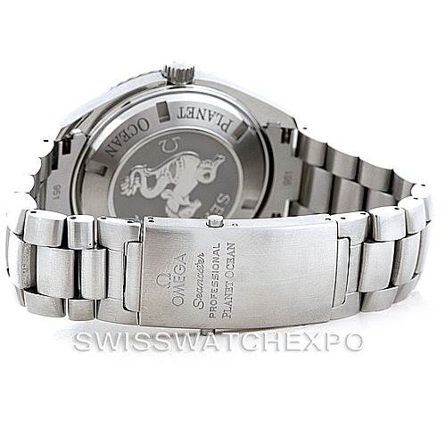 The image shows the back view of an Omega Planet Ocean 2208.50.00 Men's Stainless Steel Black Dial 2208.50.00 Men's Stainless Steel Black Dial watch, including the clasp and case back with engravings.