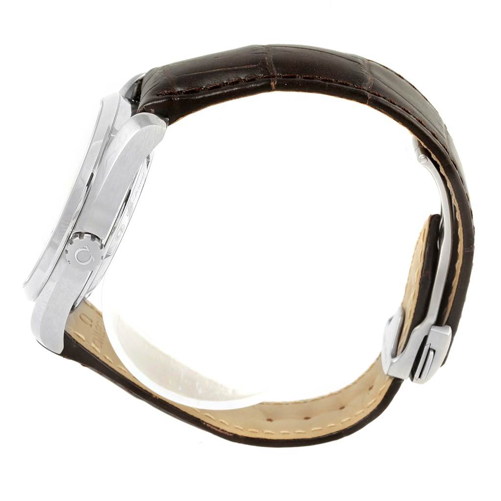 The image shows a side view of the Omega Aqua Terra 231.13.42.21.02.002 Men's Stainless Steel Silver Dial 231.13.42.21.02.002 Men's Stainless Steel Silver Dial watch, highlighting the case, crown, and leather strap.