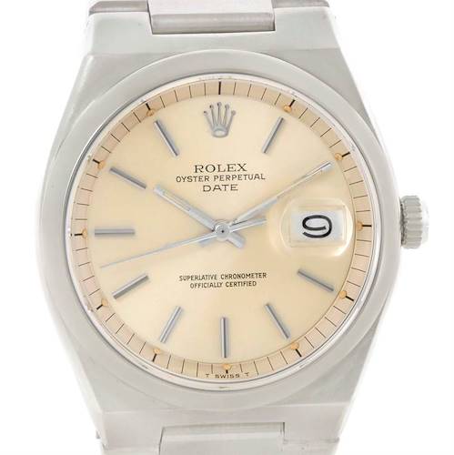 This close-up image shows the dial, crown, and part of the bracelet of a Rolex Vintage Collection 1530 Men's Stainless Steel Silver Dial 1530 Men's Stainless Steel Silver Dial Oyster Perpetual Date watch.