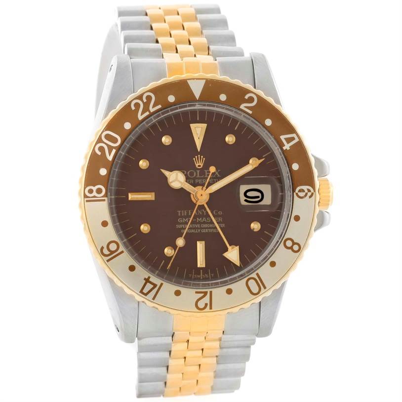 The image shows a frontal view of the Rolex Vintage Collection 1675 Men's Stainless Steel Brown Dial 1675 Men's Stainless Steel Brown Dial watch, highlighting its dial, bezel, and a portion of its bracelet.