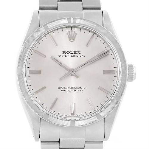 The image shows a front view of the Rolex Vintage Collection 1007 Men's Stainless Steel Silver Dial 1007 Men's Stainless Steel Silver Dial Oyster Perpetual watch, highlighting its dial, bezel, and bracelet.