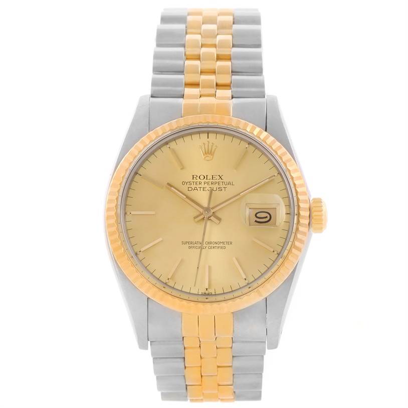 The image shows a front view of a Rolex Vintage Collection 16013 Men's Stainless Steel Champagne Dial 16013 Men's Stainless Steel Champagne Dial Datejust watch featuring a gold dial and two-tone bracelet.