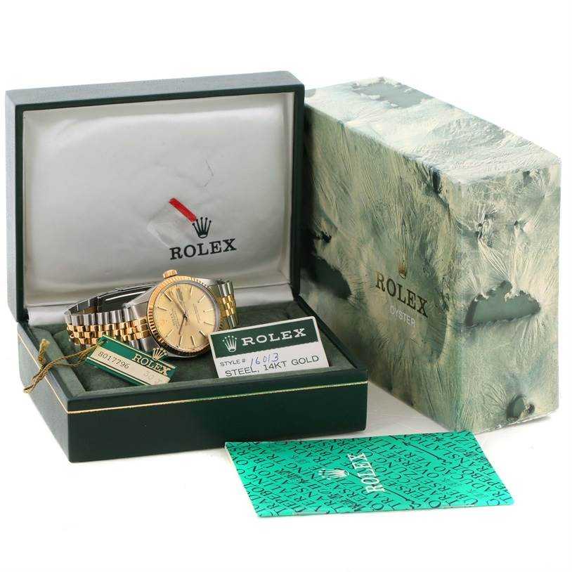 The image shows a Rolex Vintage Collection 16013 Men's Stainless Steel Champagne Dial 16013 Men's Stainless Steel Champagne Dial watch, visible inside its open box, with accompanying tags and certificates.