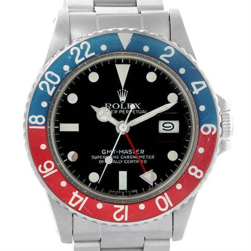 The image shows a front view of the Rolex Vintage Collection 16750 Men's Stainless Steel Black Dial 16750 Men's Stainless Steel Black Dial GMT-Master watch with a red and blue bezel and date display.