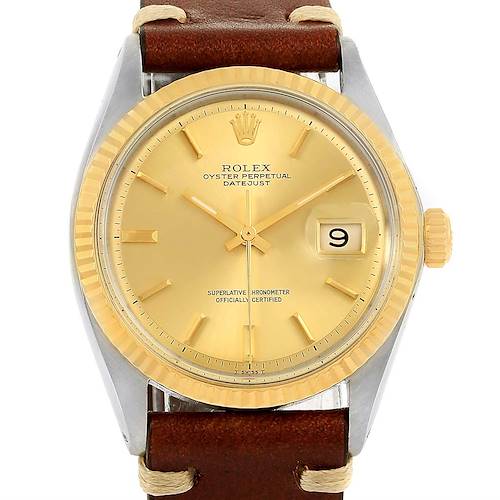 The image shows a frontal view of a Rolex Vintage Collection 1601 Men's Steel and Gold (two tone) Champagne Dial 1601 Men's Steel and Gold (two tone) Champagne Dial Oyster Perpetual Datejust with a gold dial and brown leather strap.