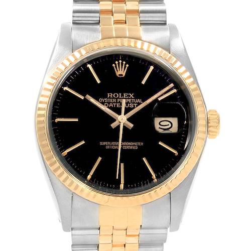 The image shows a Rolex Vintage Collection 16013 Men's Stainless Steel Black Dial 16013 Men's Stainless Steel Black Dial Oyster Perpetual Datejust watch from a frontal angle, highlighting its black dial, gold bezel, and two-tone bracelet.