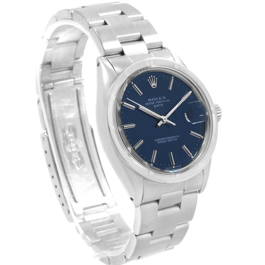 The image shows a side angle of the Rolex Vintage Collection 1501 Men's Stainless Steel Blue Dial 1501 Men's Stainless Steel Blue Dial Oyster Perpetual Date watch, highlighting its metal bracelet and blue dial.