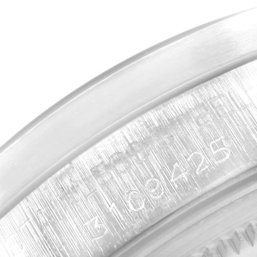 This close-up image focuses on the caseback edge and part of the engraving on the Vintage Collection model by Rolex.