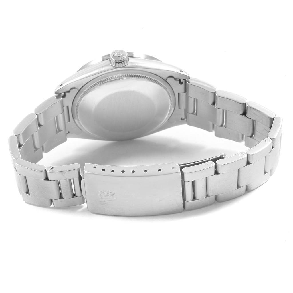 This image shows the back case, bracelet, and clasp of a Rolex Vintage Collection 1501 Men's Stainless Steel Blue Dial 1501 Men's Stainless Steel Blue Dial model watch.