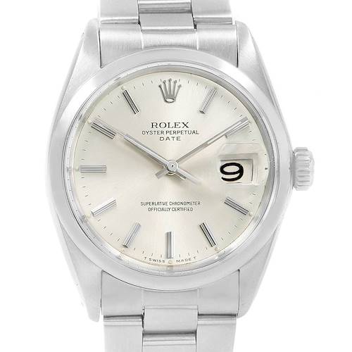 The image shows a frontal view of a Vintage Collection Rolex Oyster Perpetual Date watch, displaying its face, crown, and metal bracelet.