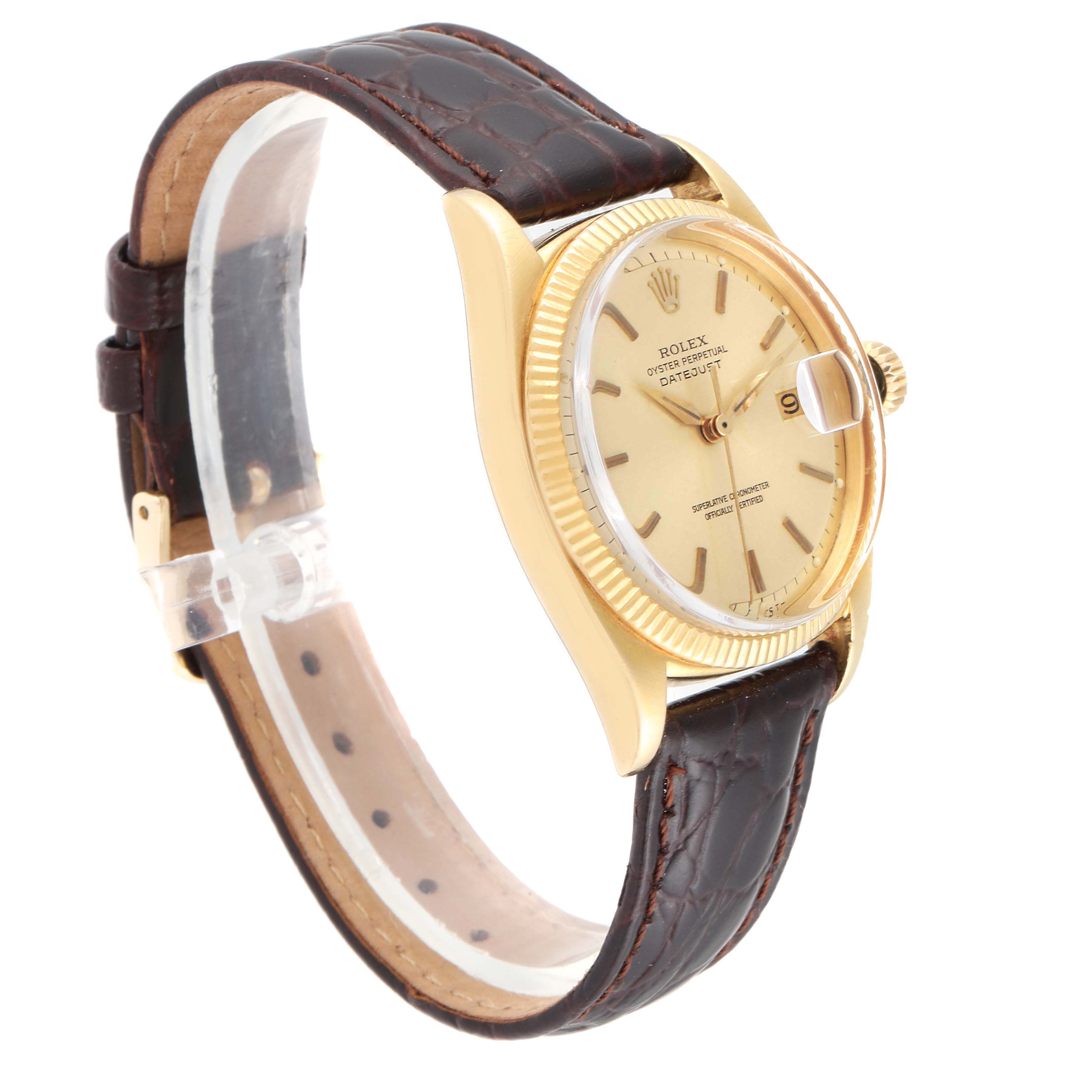 This image shows a side angle view of a Rolex Vintage Collection 6605 Men's Yellow Gold Champagne Dial 6605 Men's Yellow Gold Champagne Dial watch, featuring its brown leather strap, gold casing, and face.