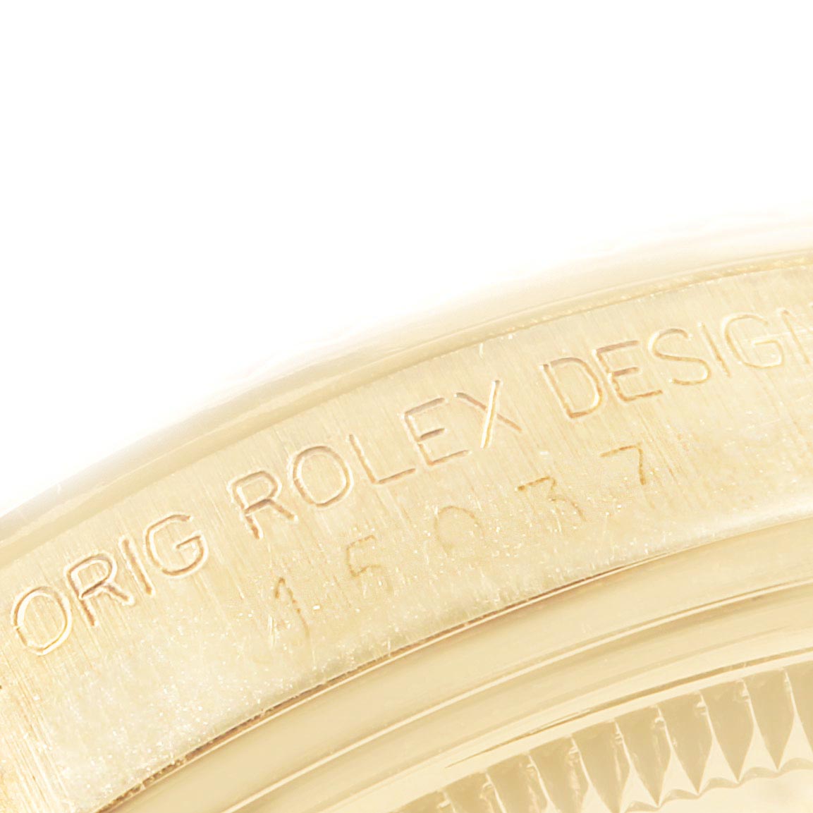 This image shows a close-up of the engraved case edge of the Vintage Collection model by Rolex.
