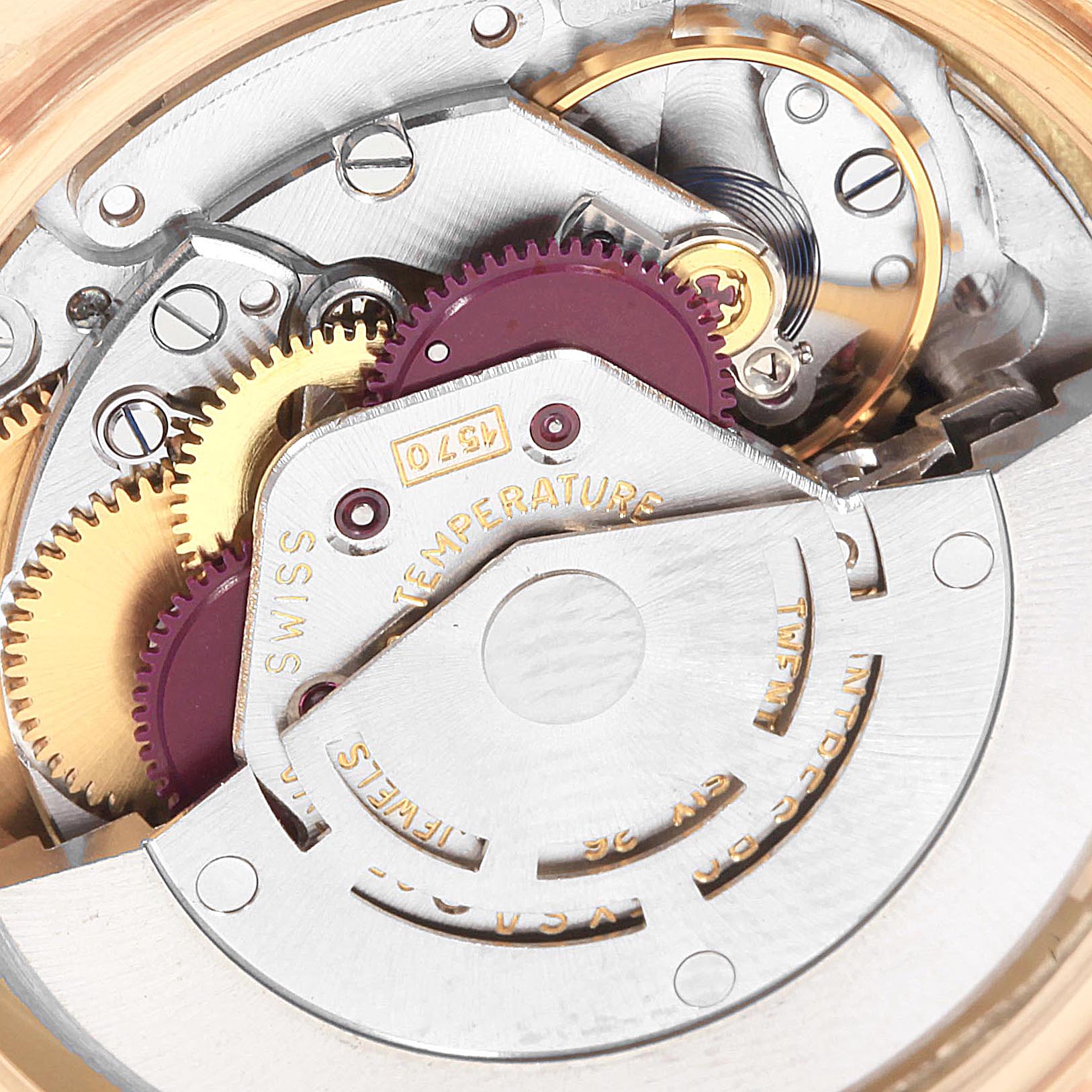 This image shows a close-up view of the internal mechanism of a Rolex Vintage Collection 1601 Men's Yellow Gold Champagne Dial 1601 Men's Yellow Gold Champagne Dial watch.