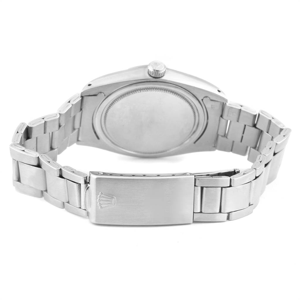The image shows the back case and bracelet of the Rolex Vintage Collection 6694 Men's Stainless Steel Silver Dial 6694 Men's Stainless Steel Silver Dial model watch from a rear angle.