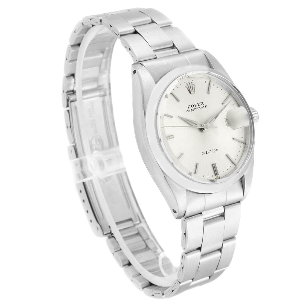 The image shows the Vintage Collection model by Rolex, viewed at an angle that highlights the dial, case, and bracelet.