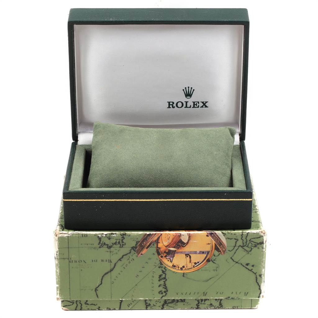 The image shows an open Rolex Vintage Collection 6694 Men's Stainless Steel Silver Dial 6694 Men's Stainless Steel Silver Dial watch box with a green cushion inside, viewed from the front angle.