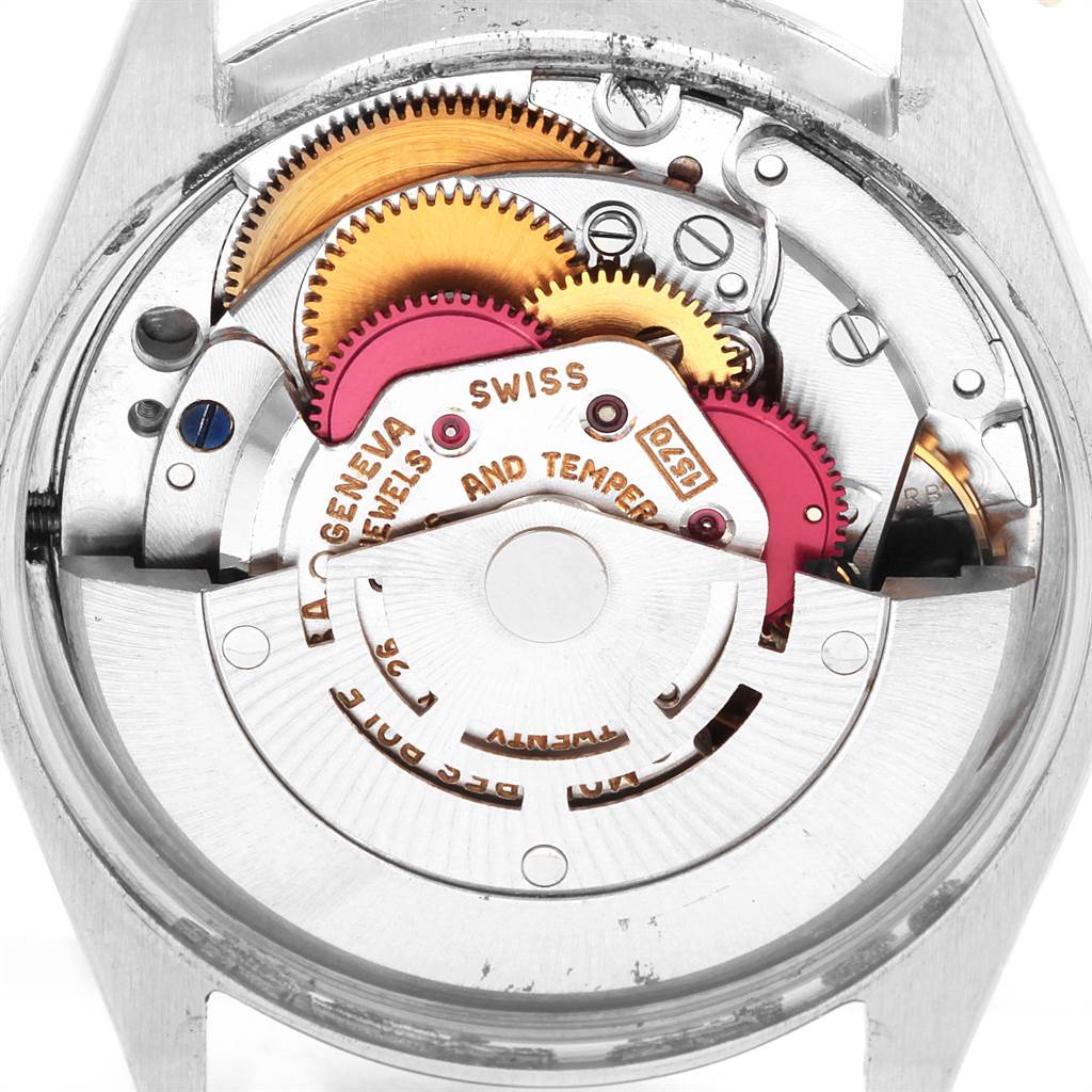 This image shows the intricate internal mechanism of a Vintage Collection model by Rolex, viewed from the back.