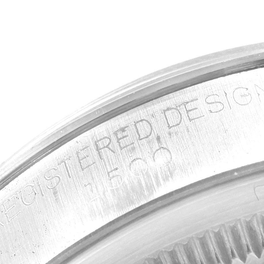 This image shows a close-up of the side with engraved text of the Rolex Vintage Collection 1500 Men's Stainless Steel Silver Dial 1500 Men's Stainless Steel Silver Dial model.